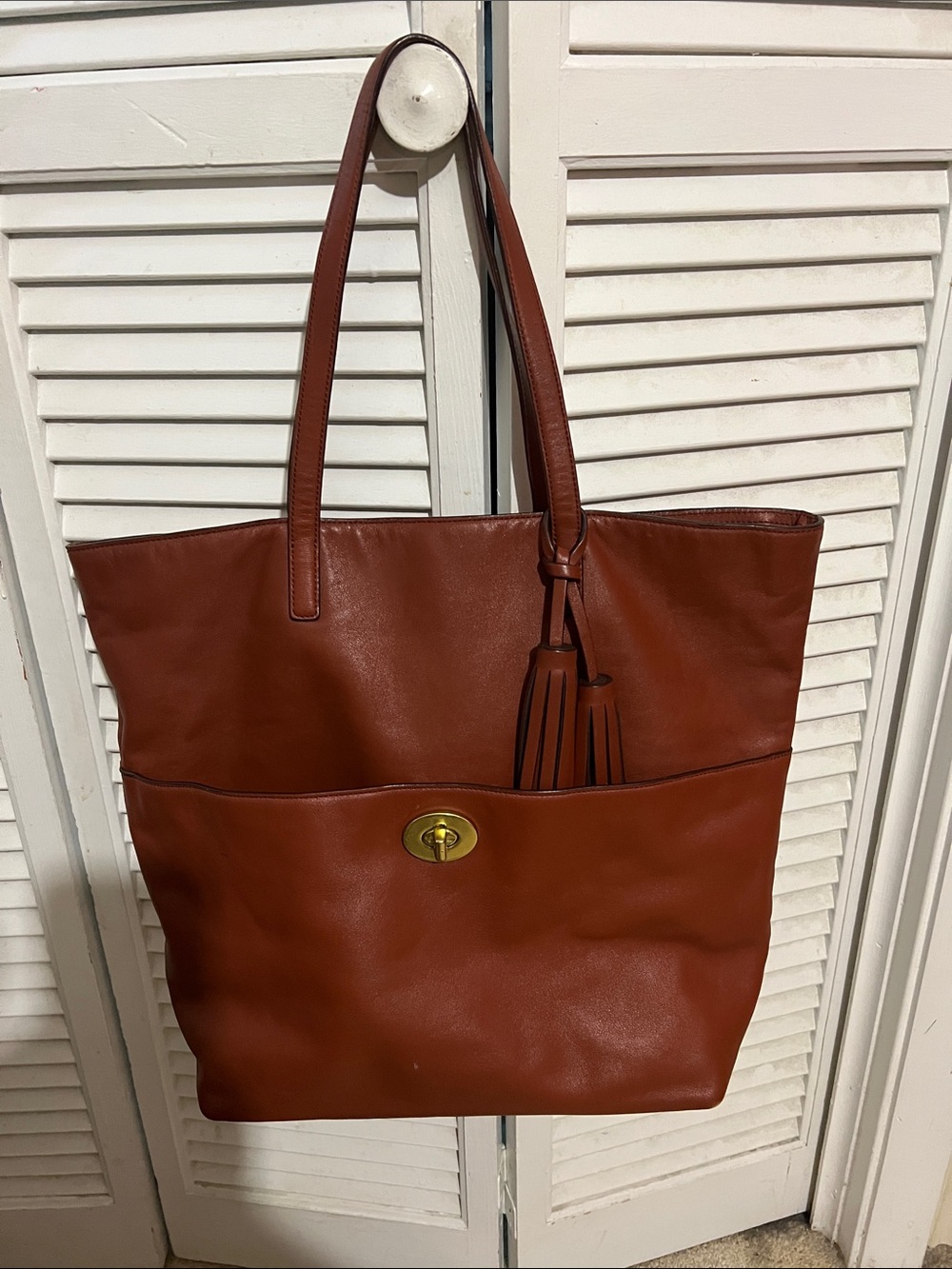 Coach Brown Leather Tassel Tote with Gold Turnlock
